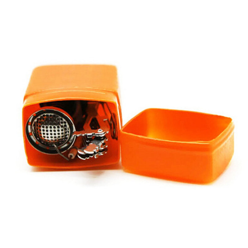 Camping mini stove, compact portable design for outdoor cooking, shown from the side