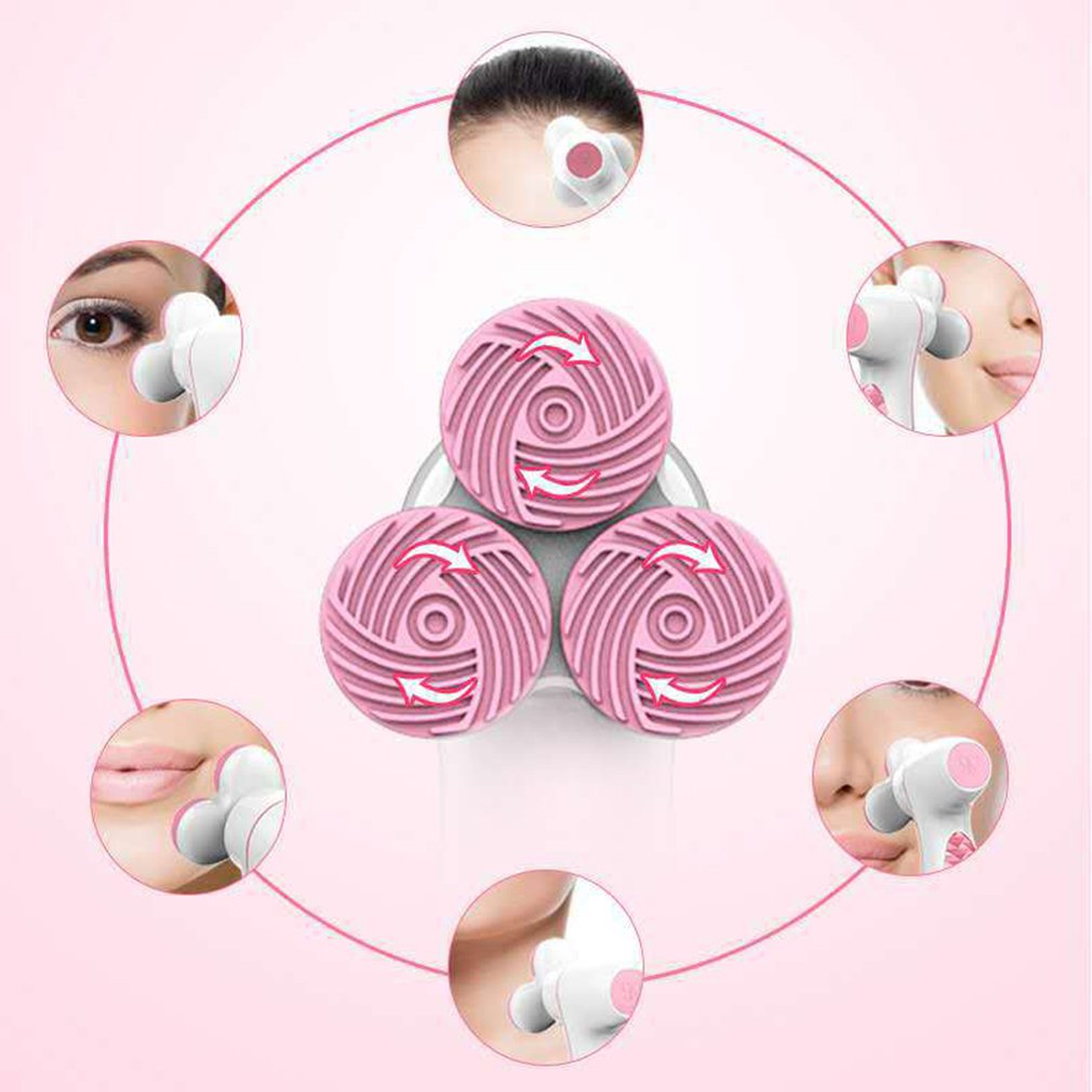 Three round 3D silicone cleansing instruments in assorted colors
