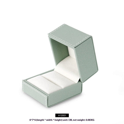 Jewellery box ring storage box with cushioned compartments for organizing rings, shown open