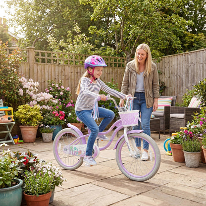 Purple kids bike with 20-inch wheels, training wheels, and front basket, designed for children’s outdoor riding.