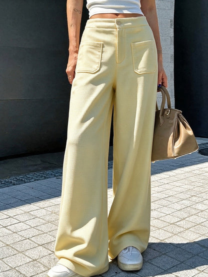 Women's casual loose-fit waffle-knit multi-color wide-leg pants, front view of textured fabric and relaxed silhouette