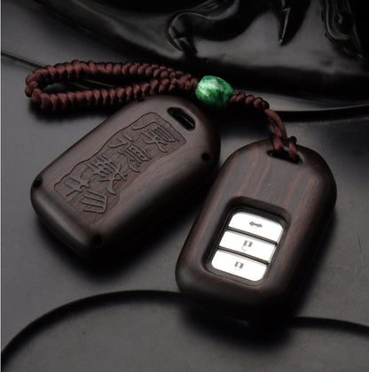 Sandalwood key case with natural wood grain and compact design
