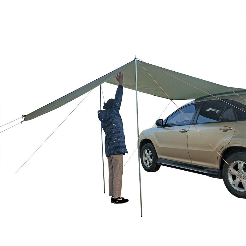Car side awning mounted beside a vehicle, showing its extended canopy and sturdy support frame