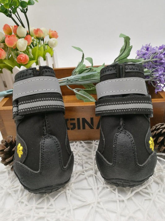 Dog shoes for pets, protective pet footwear in black with adjustable straps