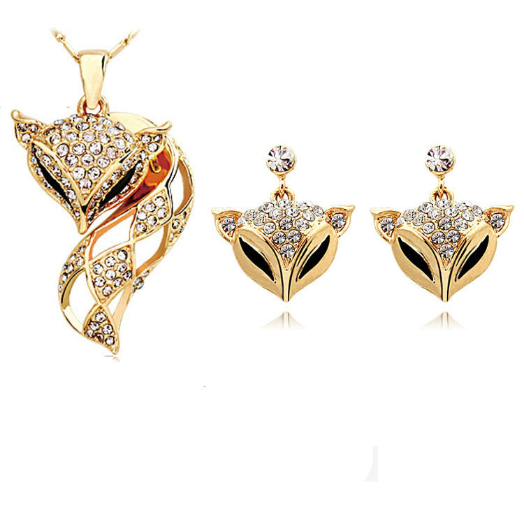 Fox necklace and earring set featuring matching fox-themed jewelry designs