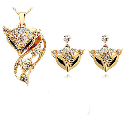 Fox necklace and earring set featuring matching fox-themed jewelry designs