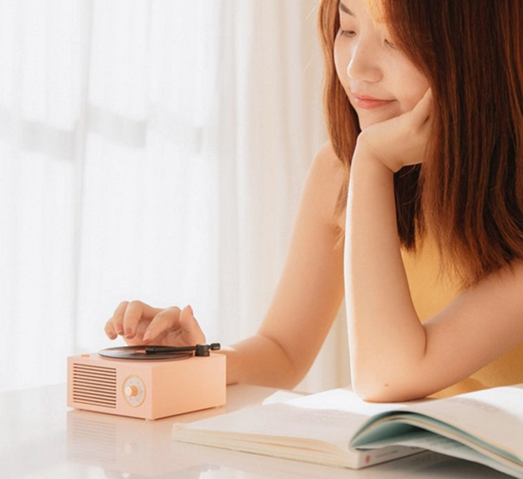 Retro vinyl wireless Bluetooth small sound speaker in compact record-player-inspired design
