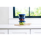 Six blue glass storage containers with lids, 16 oz round glassware set by Dura Living for kitchen organization.