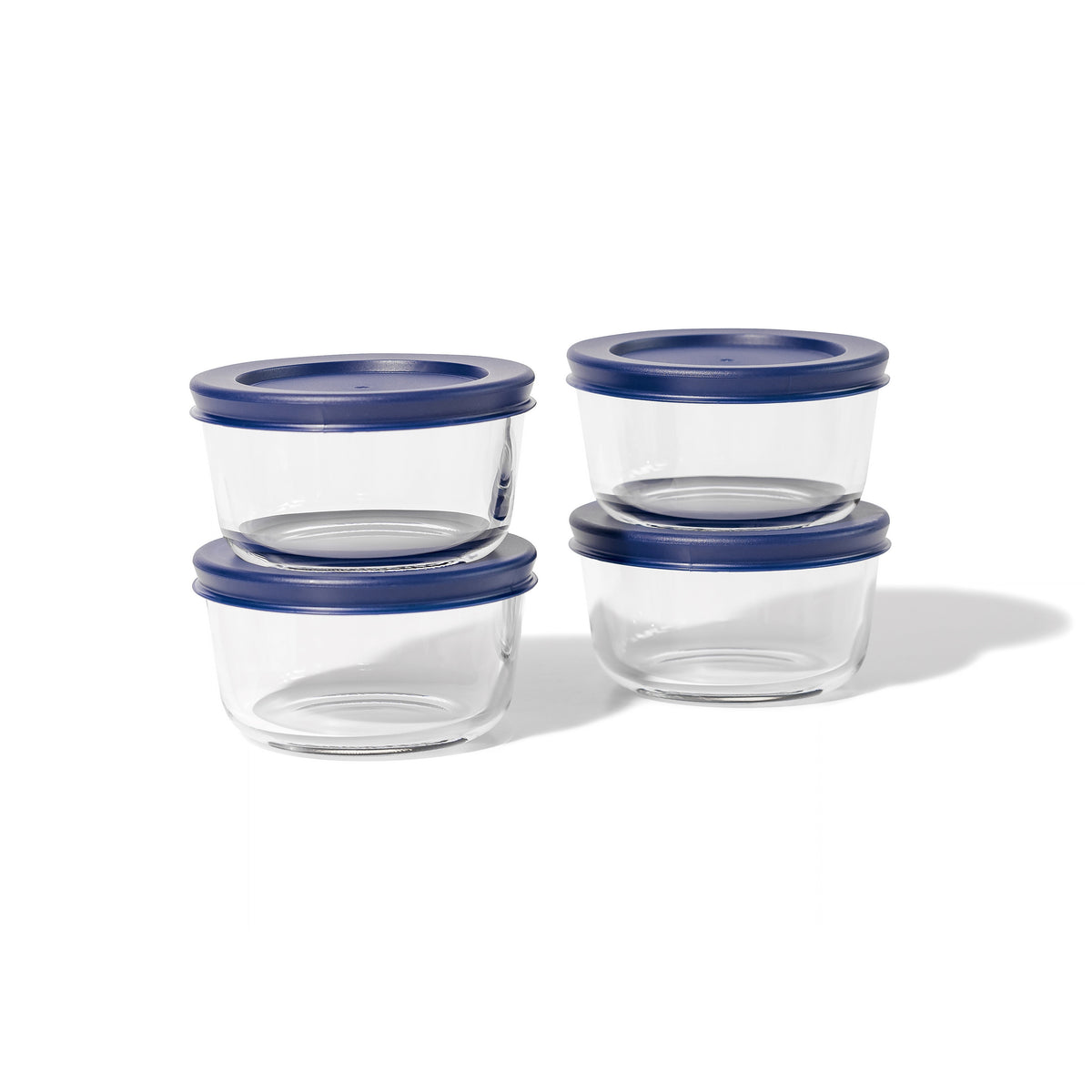 Set of 8 round glass storage containers with blue lids from Dura Living, 7 oz capacity, ideal for kitchen organization.