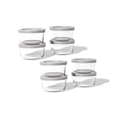 Set of 16 Dura Living round glass storage containers with grey lids, 7 oz capacity, ideal for kitchen organization and food storage.