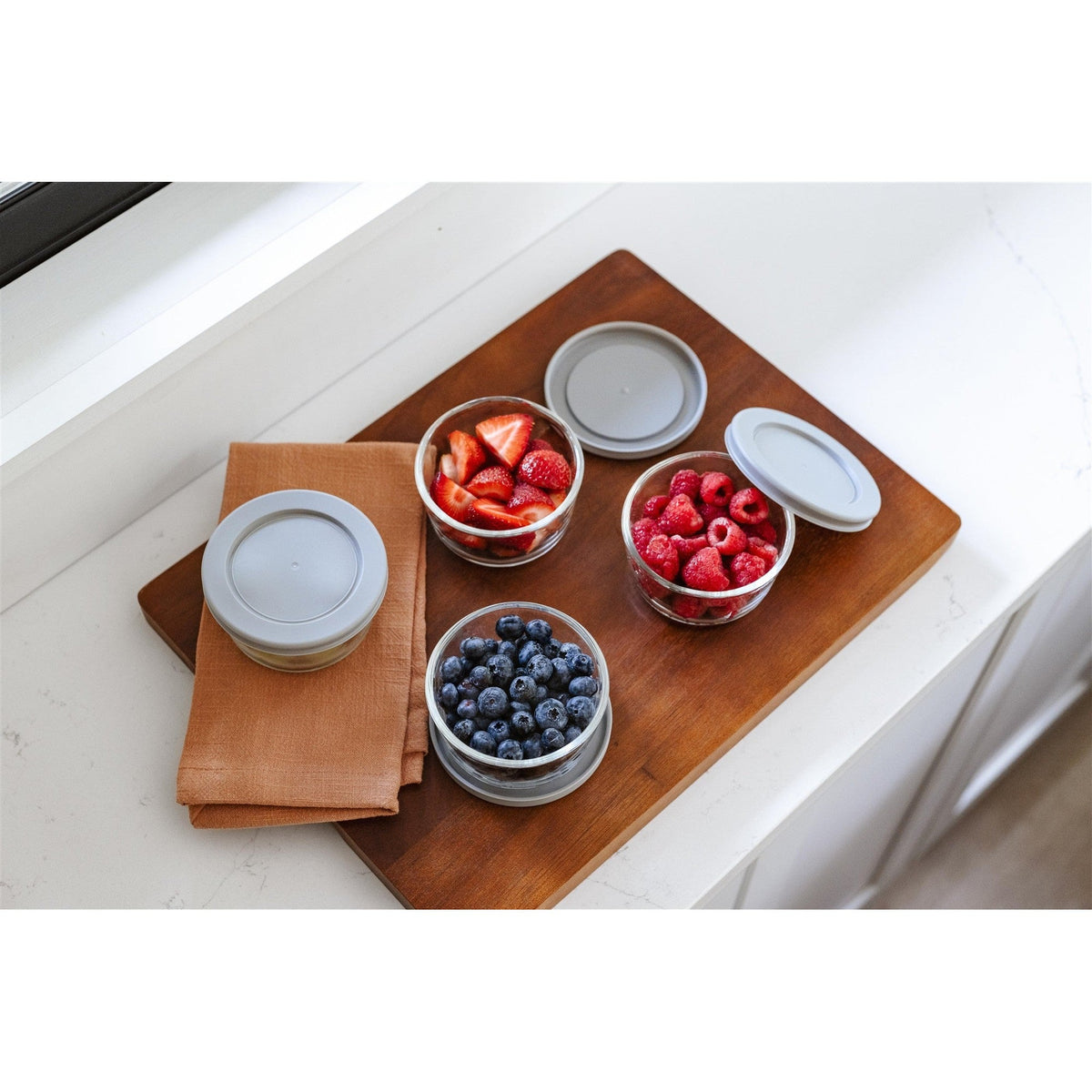 Set of 16 round glass storage containers with grey lids, Dura Living glassware, 7oz capacity for food storage.