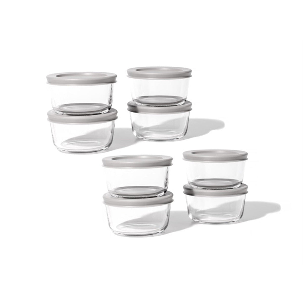 Set of 16 Dura Living round glass storage containers with grey lids, 7oz capacity, for kitchen organization and food storage.