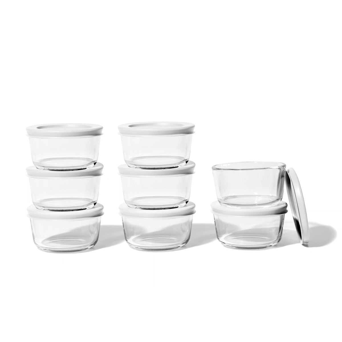 Set of 16 round glass storage containers with lids, 1 cup (8oz) capacity, white Dura Living glassware for kitchen storage.