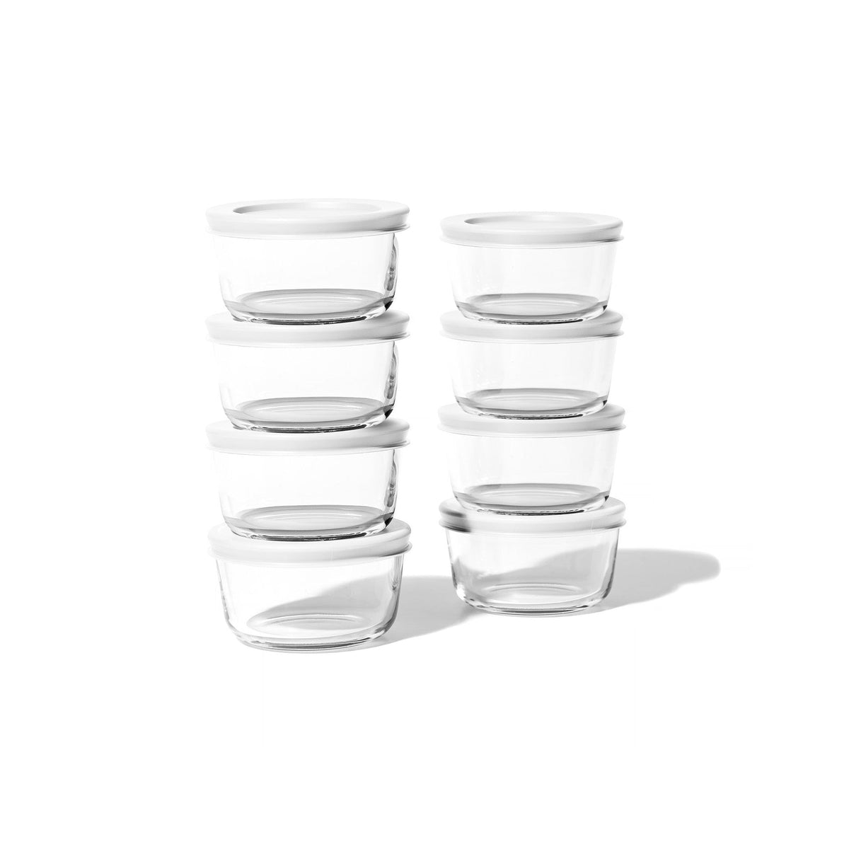 Set of 16 round glass storage containers with white lids, 1 cup (8oz) capacity, durable Dura Living glassware for kitchen storage.