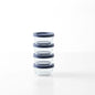 Set of eight Dura Living glass storage containers with blue lids, 1-cup (8 oz) round glassware for kitchen storage.