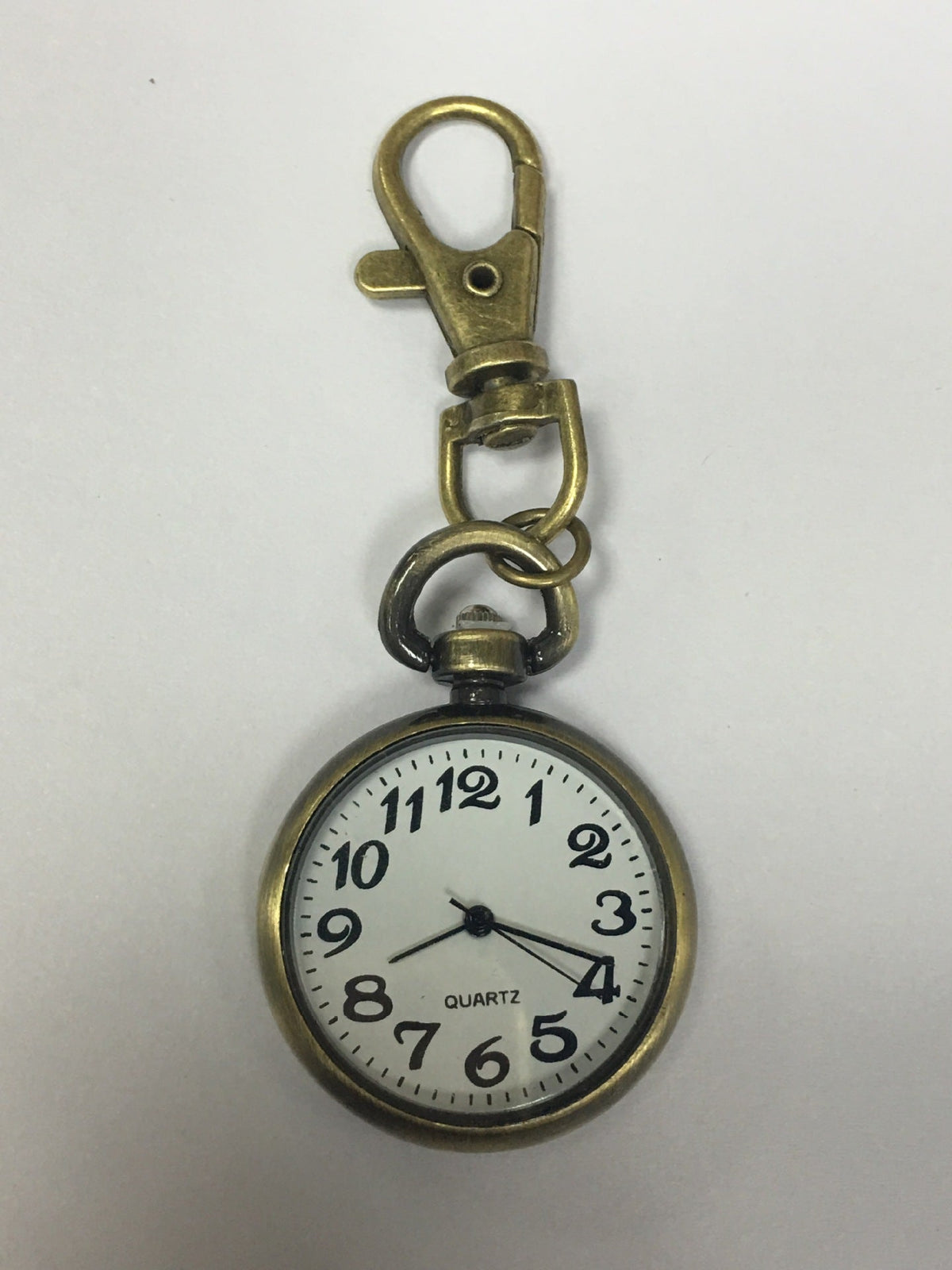 Vintage pocket watch with classic round case and visible clock face#+#+#+#+