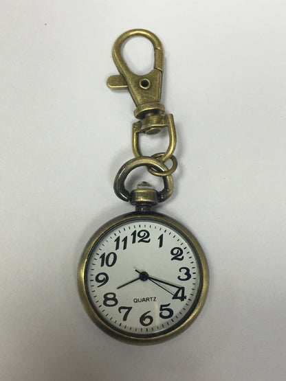Vintage pocket watch with classic round case and visible clock face#+#+#+#+