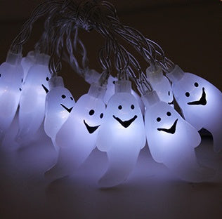 Halloween pumpkin LED string lights lantern decoration, glowing pumpkin shapes on a light string
