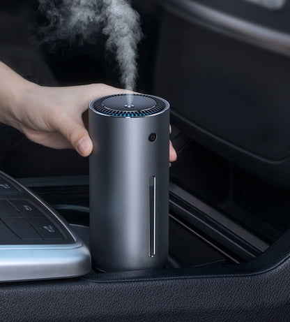 Black car humidifier with compact cylindrical design for vehicle cup holders