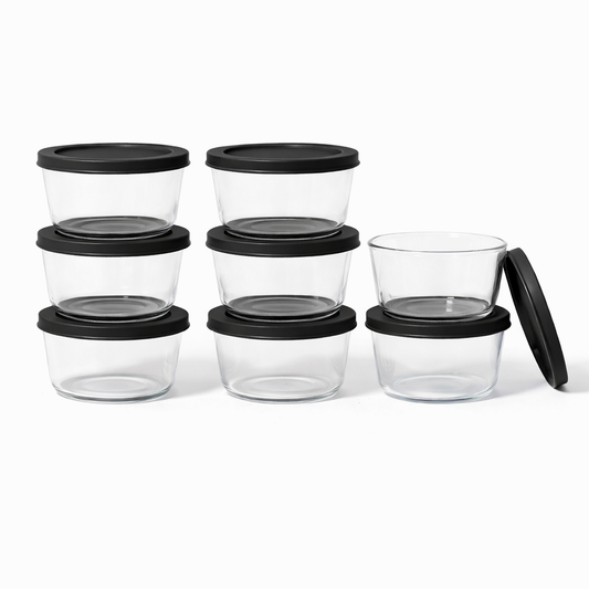 Set of 16 Dura Living glass storage containers with black lids, 1 cup (8 oz) round glassware for kitchen organization.