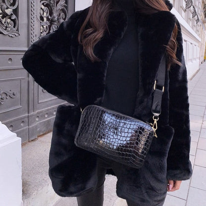 Women's long sleeve lapel faux fur coat in solid color – front view