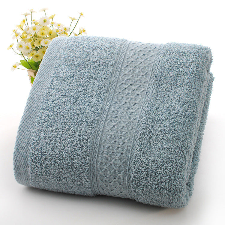 Thickened bath towel beach towel in soft, absorbent fabric, displayed flat