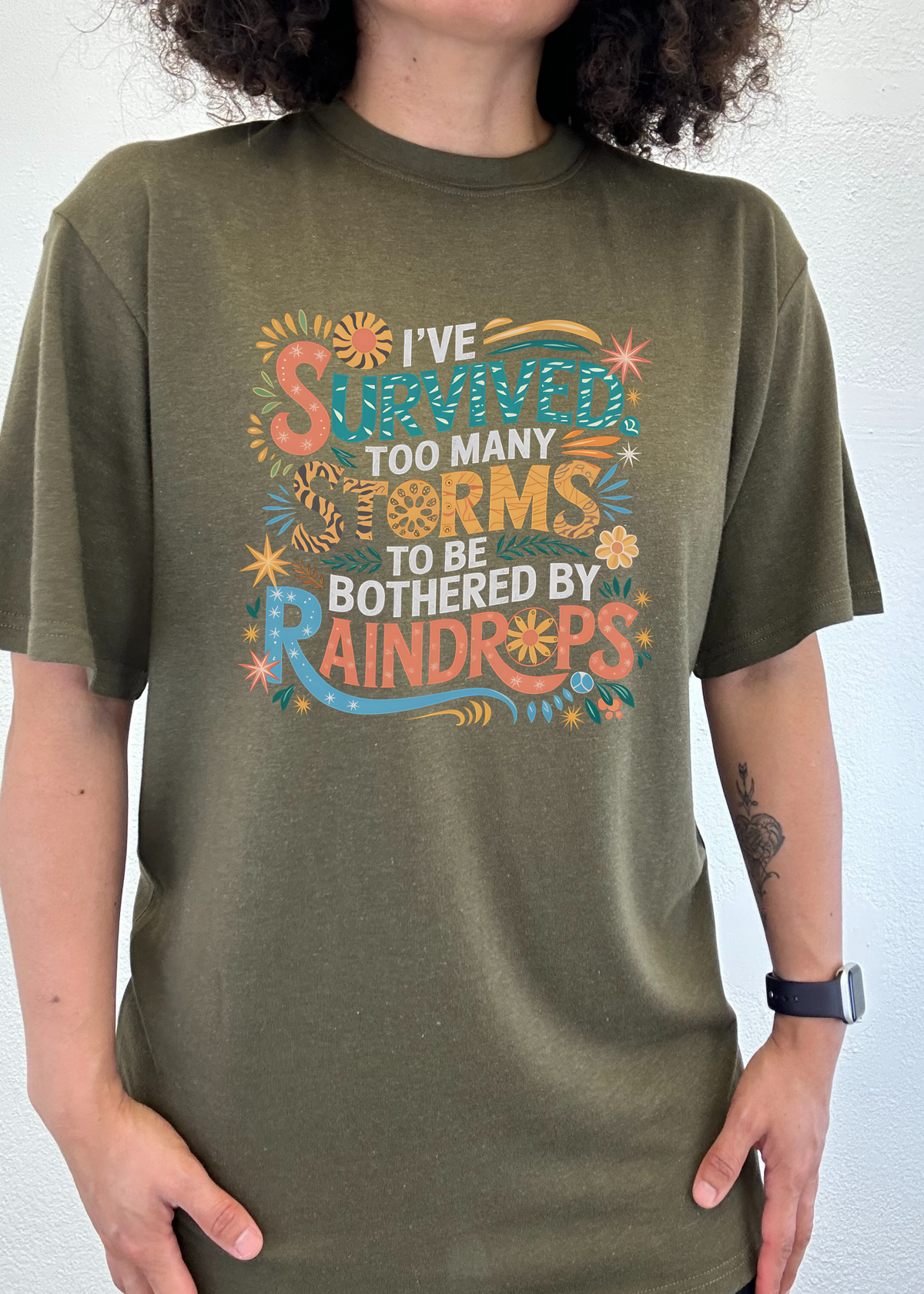 Unisex bamboo cotton graphic T-shirt with "I've Survived Too Many Storms" print by Spun Bamboo, men's casual printed tee.