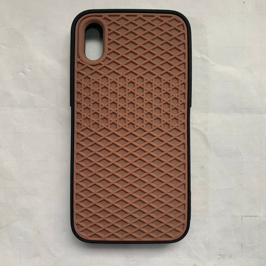 Waffle sole silicone phone case in a textured black design with raised grip pattern