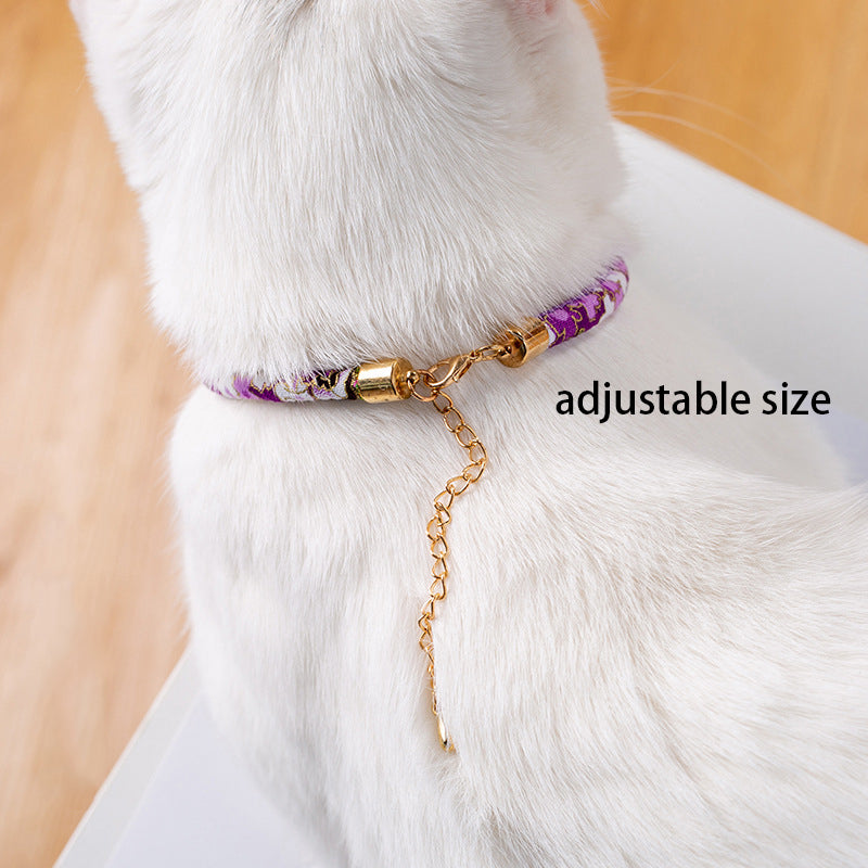 Ethnic-style bell collar with decorative design and adjustable fit