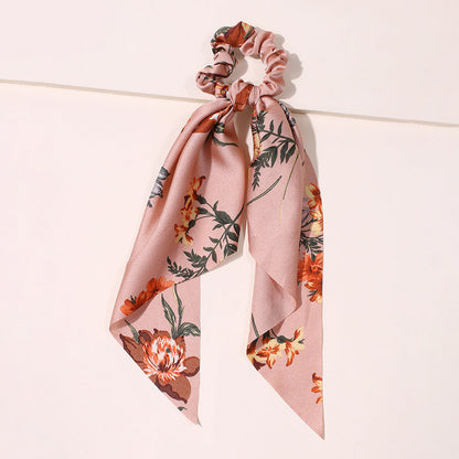 Cute scrunchies pack and headband for women, colorful hair accessories displayed together