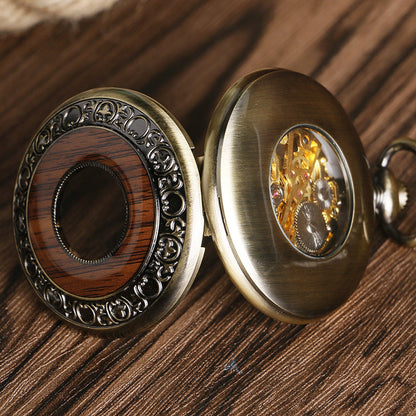 Silver manual mechanical pocket watch with classic dial and visible winding crown