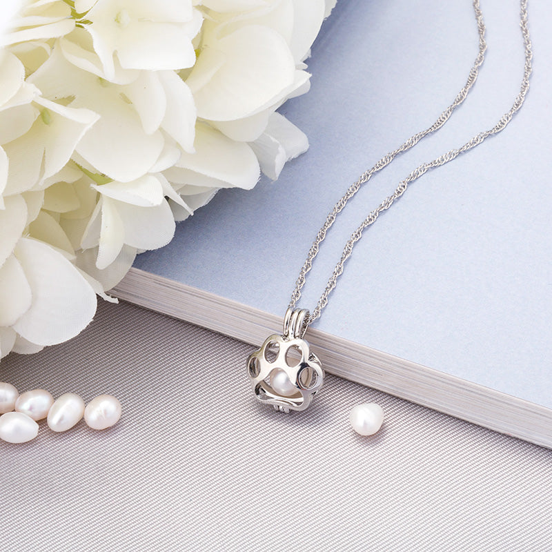 Animal night light necklace with colorful animal pendant on a delicate chain.
