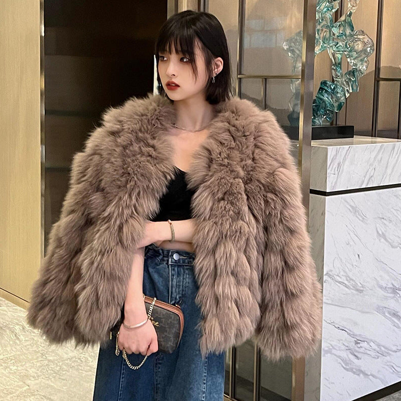 Women's winter faux fox fur coat in a plush textured finish
