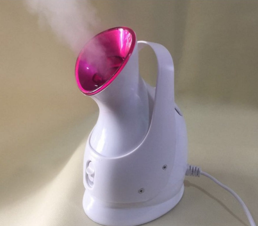 Humidifying steaming machine by My Store with visible steam output and water reservoir