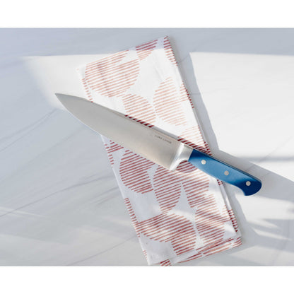 Dura Living Superior 3-Piece Kitchen Knife Set with Royal Blue handles, including chef’s, paring, and bread knives on a cutting board.