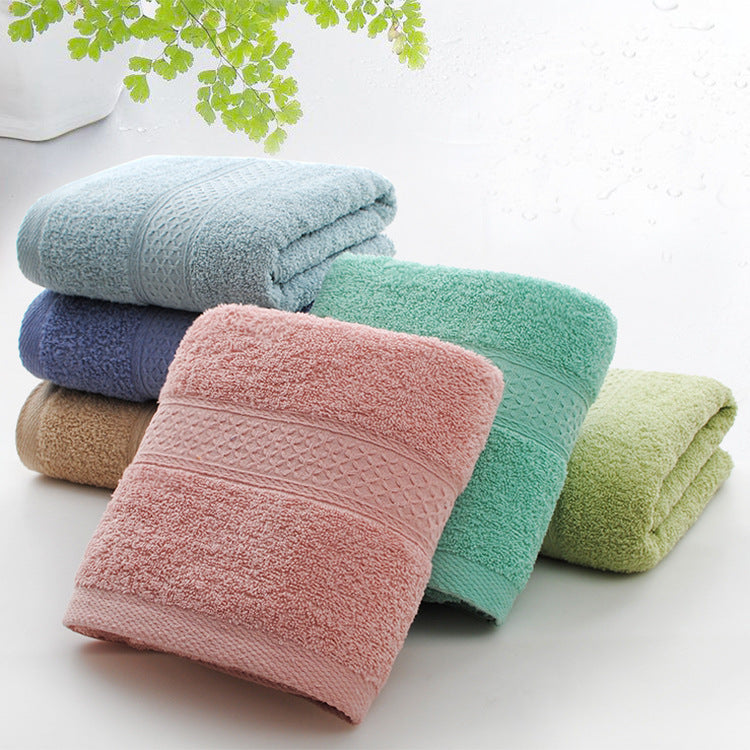 Thickened bath towel beach towel by My Store, soft textured fabric shown flat