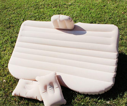 Inflatable car bed showing a spacious cushioned sleeping surface for travel-resting in vehicles