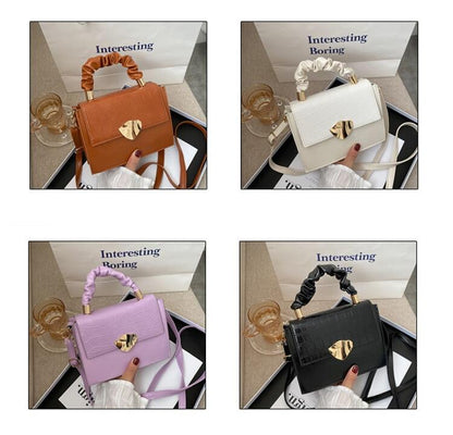 BACKUPMYFILESNOW® women's crossbody handbag with stone pattern design, featuring a compact and stylish accessory for everyday use.