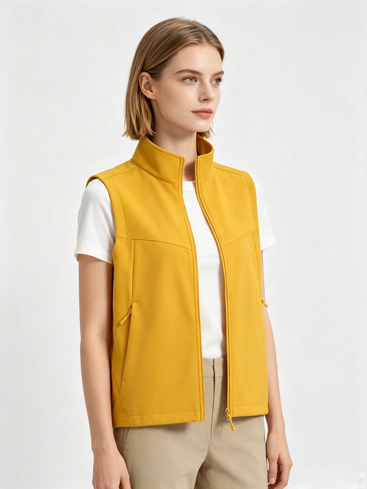 Men and women softshell vest with stand collar, zip front, sleeveless design, and fleece lining for outdoor wear