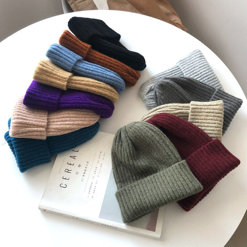 Warm knitted hat in soft textured fabric, close-up product view