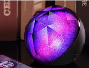 LED seven-color Bluetooth speaker magic ball with multicolor lights and compact spherical design