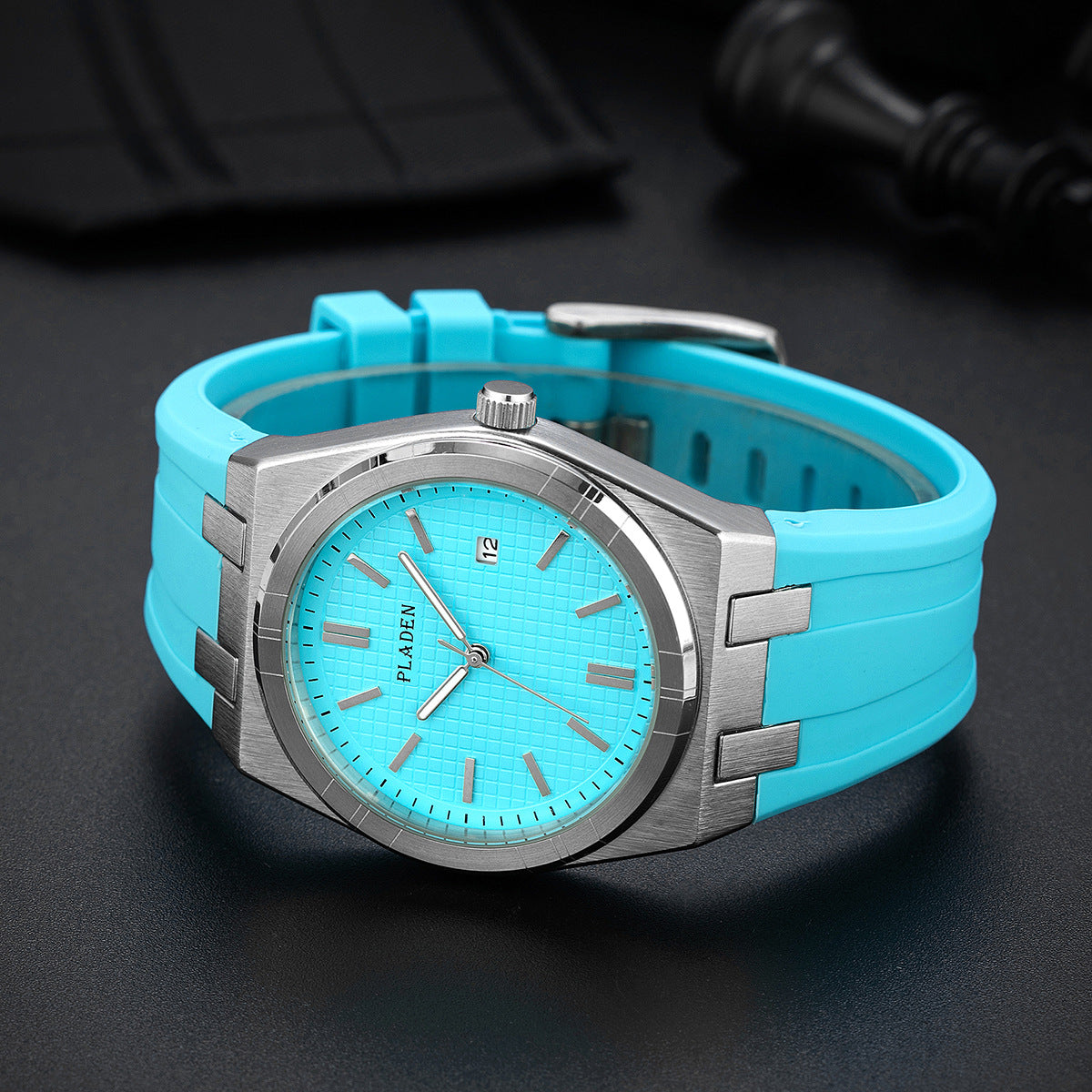 Simple business quartz watch with a black silicone strap and minimalist round dial