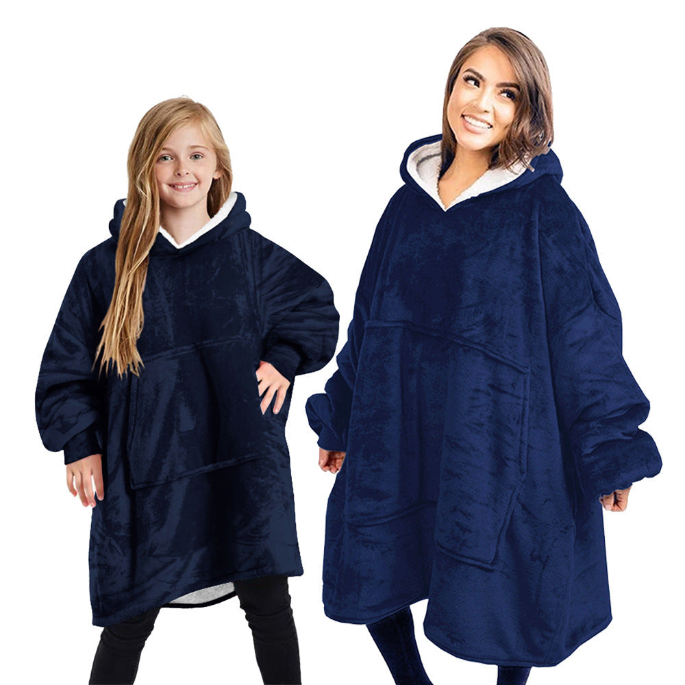 Warm cashmere blanket folded and displayed in a soft neutral shade
