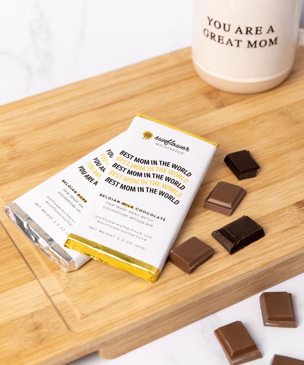 Sunflower Motherhood Belgian chocolate bar with smooth, rich chocolate squares in a sleek wrapper.
