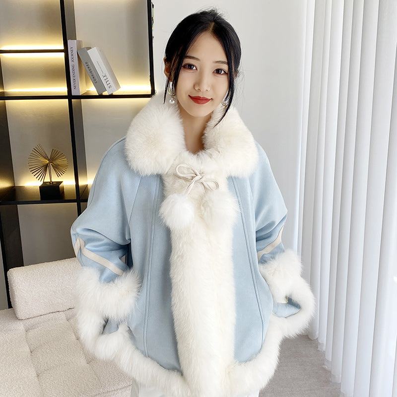 Women's one-piece patchwork fur coat in mixed tones, full-length view