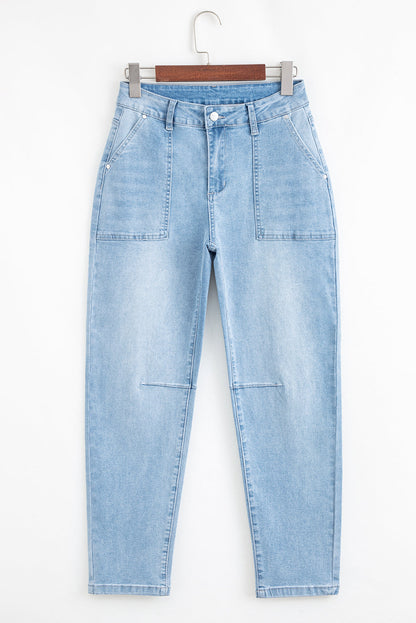 Light blue Lacey Relaxed Patch Jeans by Threaded Pear, featuring lace details and a relaxed fit, displayed on a mannequin.