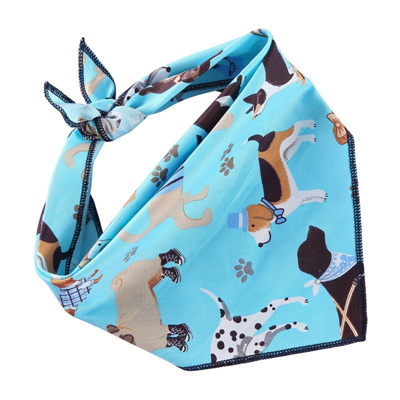 Dog triangle scarf in a colorful pattern, shown flat for a clear view of the pet accessory