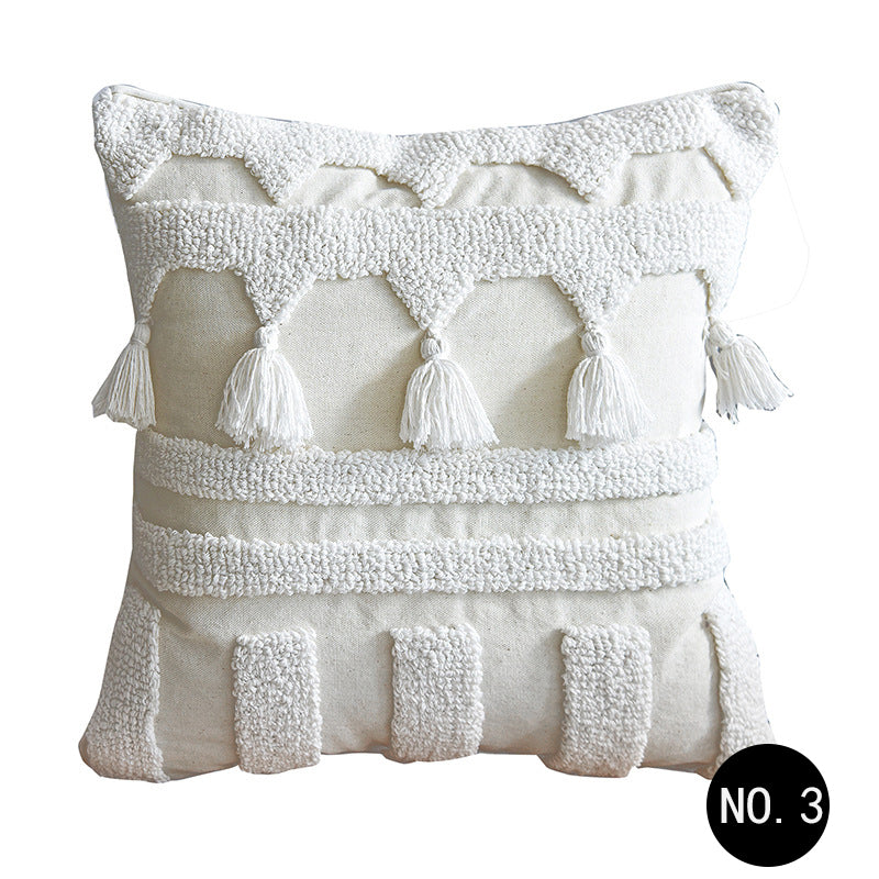 Nordic Moroccan tufted throw pillow with a simple textured pillowcase in a neutral design