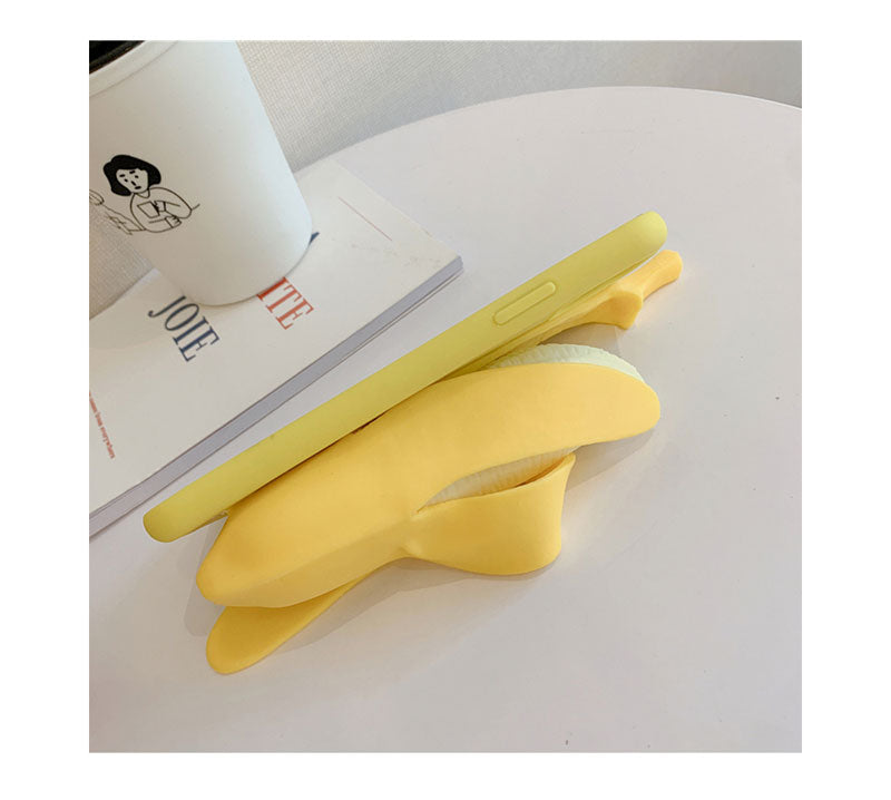 Unzip banana silicone phone case in bright yellow with playful banana design and zipper detail