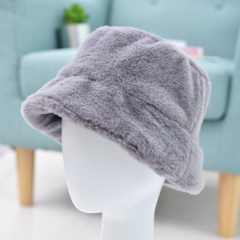 Warm fur hat viewed from the front, showcasing its soft texture and cozy design